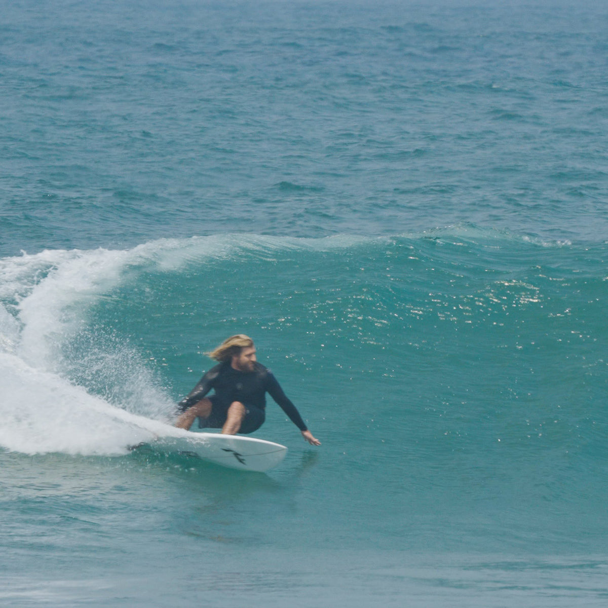 Wade Carmichael turning his 421 fish as hard as humanly possible - Rusty Surfboards